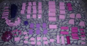 Lote LEGO piezas rosadas y moradas S/.