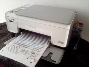 impresora multifuncional con sistema de tinta continua.