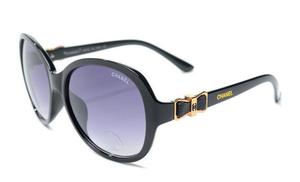 REMATO LENTES DE SOL NEGROS MARCA CHANEL CON LACITO A LOS