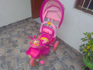 triciclo para niña en buen estado con luces y sonido