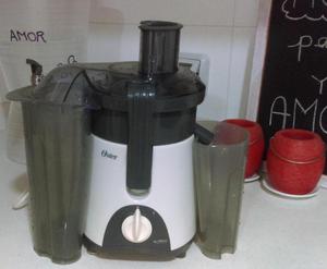 Extractor de jugos OSTER modelo