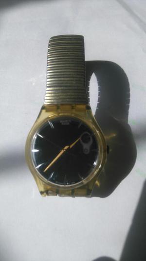 Vendo Fino Reloj Swatch Suizo Dorado