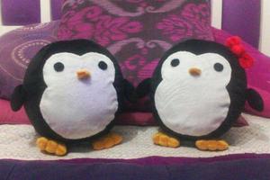 Peluches pareja de pingüinos