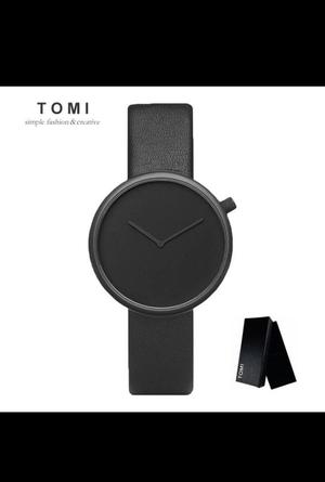 Reloj Tomy