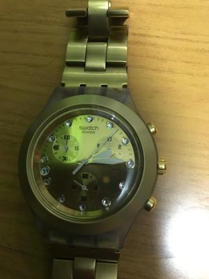 Vendo Reloj Swatch Diaphane Dorado