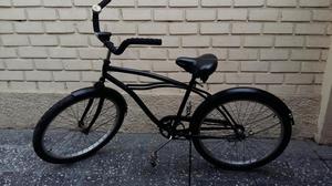 Bicicleta MonarkBeach Cruiser color negro contra pedal aro