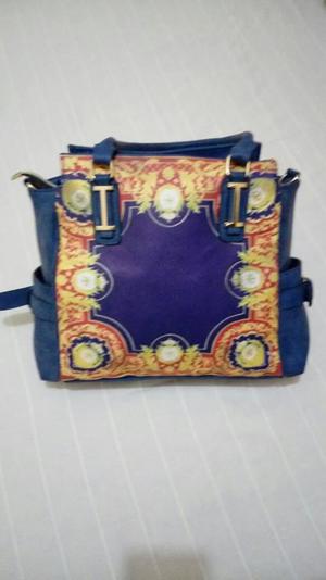 VENDO HERMOSA CARTERA AZUL