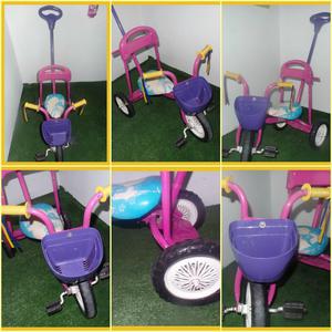triciclo de niña con guiador
