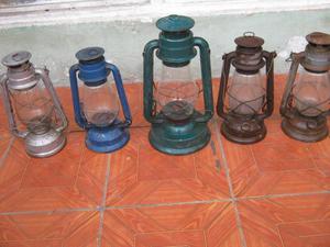 5 antiguos lamparines de kerosene