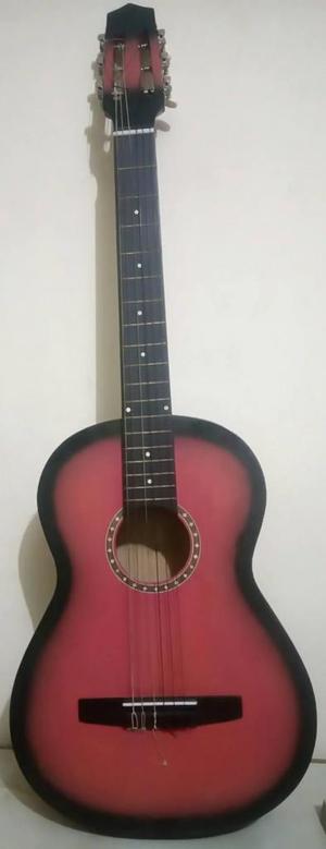 Guitarra Acústica color fuxia con bordes negros y estuche