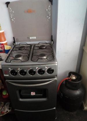 Vendo Cocina con Valon de Gas en Uso