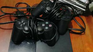 Playstation2 con 2 Mandos Juegos
