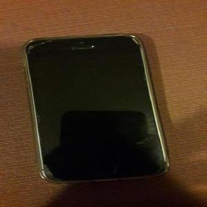 Vendo iPhone 5S,Gris,16Gb,con audífonos y cargador