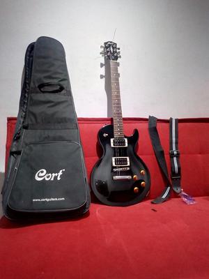 Guitarra Les Paul Cort con Funda Y Corre