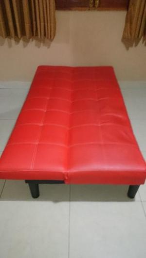 Sofá cama,color rojo.