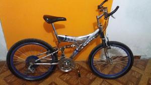 Vendo Bicicleta montañera DE DOBLE AMORTIGUADOR AROS DE