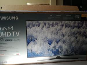 Vendo mi TV 49 UHD 4K Nuevo curvo, cerrado de tienda