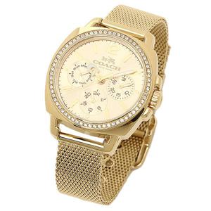 Reloj dorado Coach