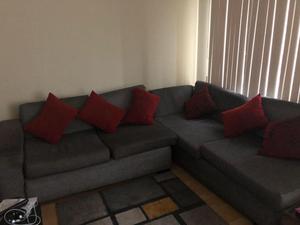 Sofa seccional gris en L 32