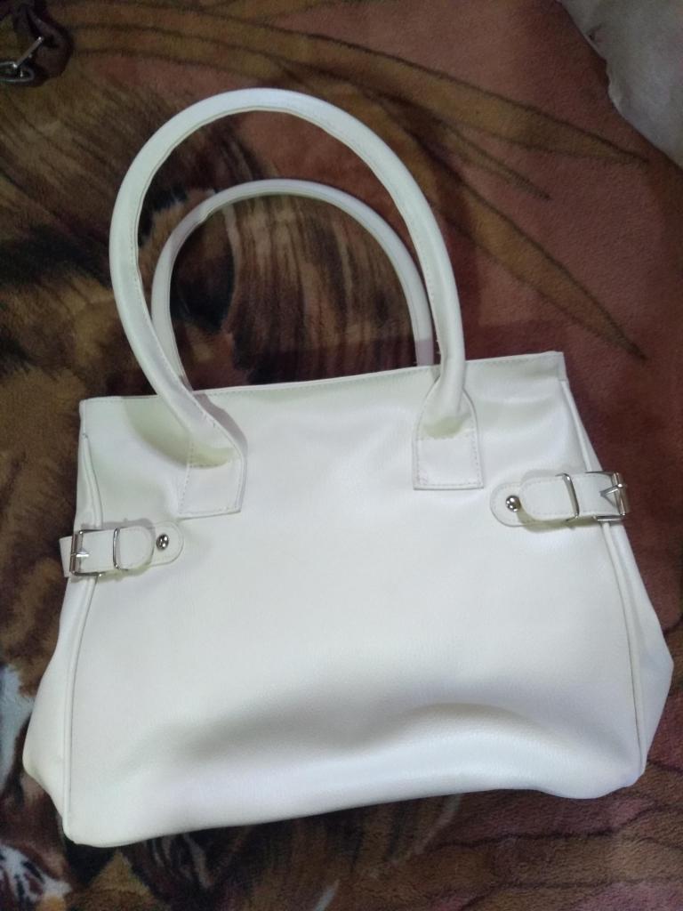 Venta de cartera color crema NATURA