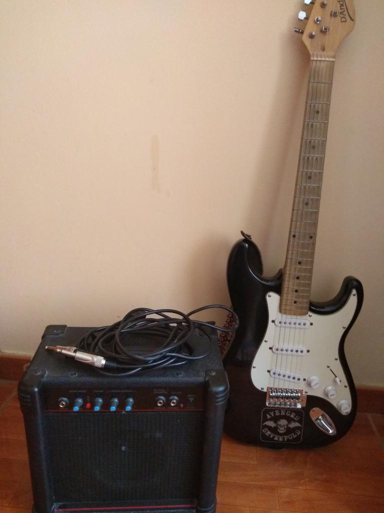 Guitarra con Amplificador