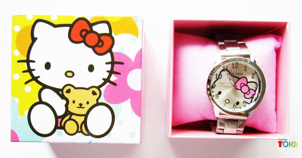 Reloj Hello Kitty Plateado Con Rhinestones. Incluye caja de