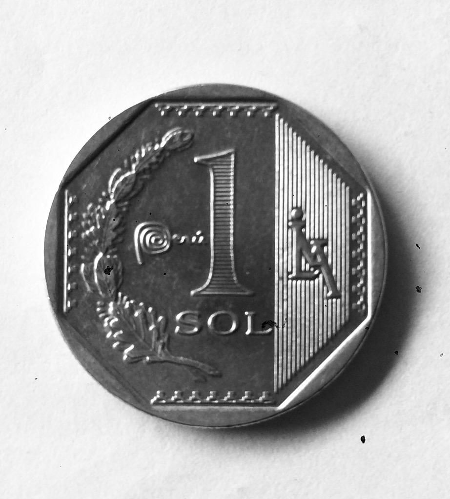 Moneda Rara Acuñada Verticalmente