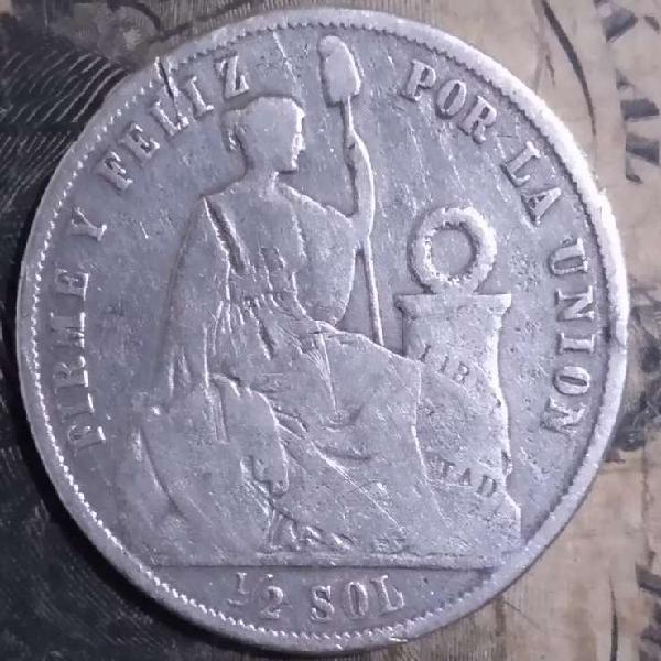 Moneda 1/2 sol 1865 plata 9 decimos.